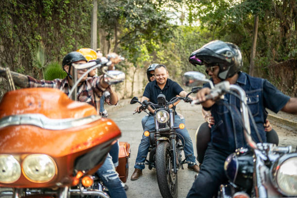 Mature couples having a road trip on a motorbike