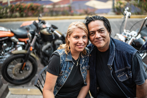 Portrait of traveler biker mature couple outdoors