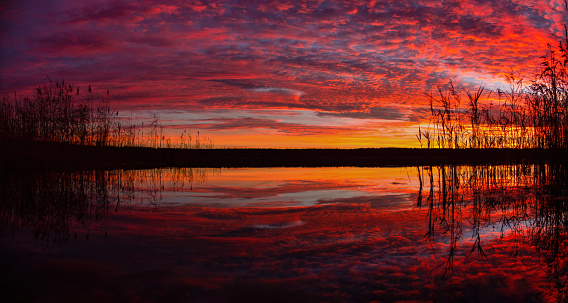 Lake and sunset with vibrant fall colors