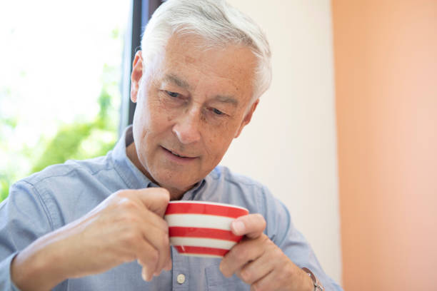 istock Contented mature man with a coffee cup 1496199606