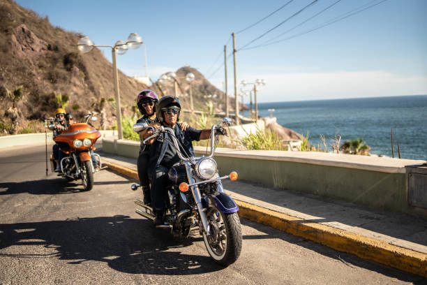Mature couples having a road trip on a motorbike