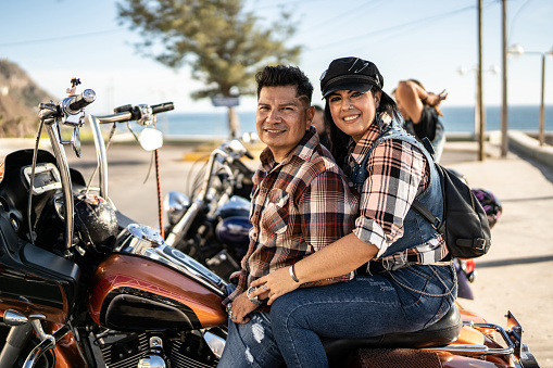 Portrait of mature couple on a motorcycle road trip