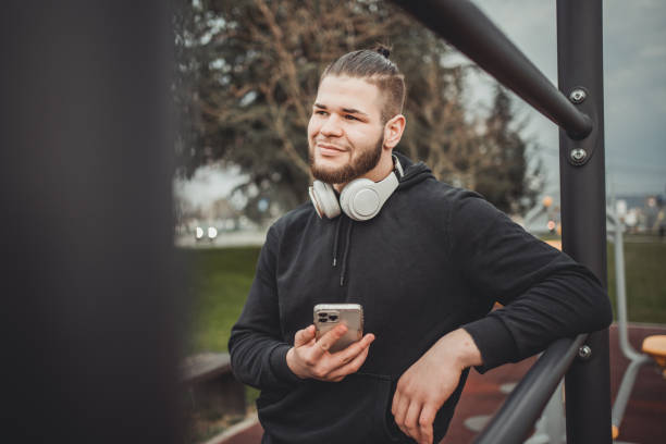 istock One young man athlete taking a break during outdoor training 1496202191