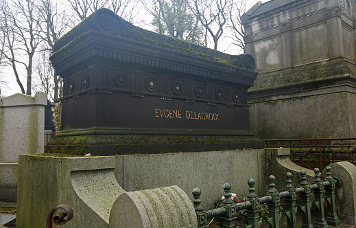 The tombstone of famous French painter Eugene Delacroix in Pere Lachaise in Paris, France