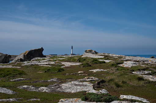 Île de Sein is a small island located in the Atlantic Ocean, facing the extreme west of Brittany coast and Pointe du Raz. Given the number of reefs in this zone,  it is known for being dangerous for navigation.