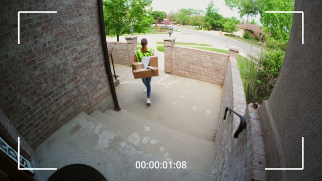 Home Security Camera Footage of Package Delivery