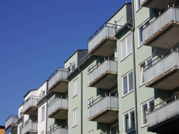 istock Low angle view of building against clear blue sky 1496215094