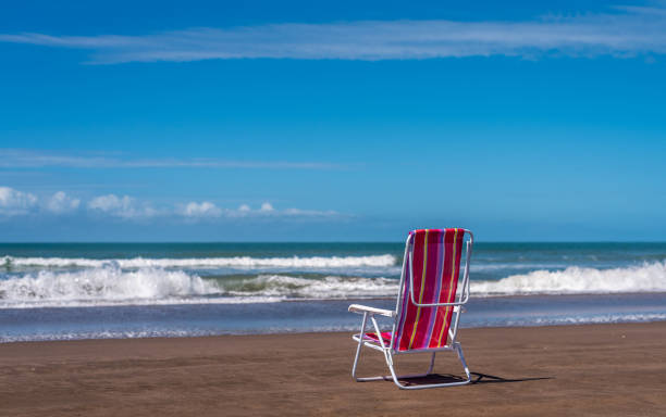 istock Beach chair on the seashore. 1496215722