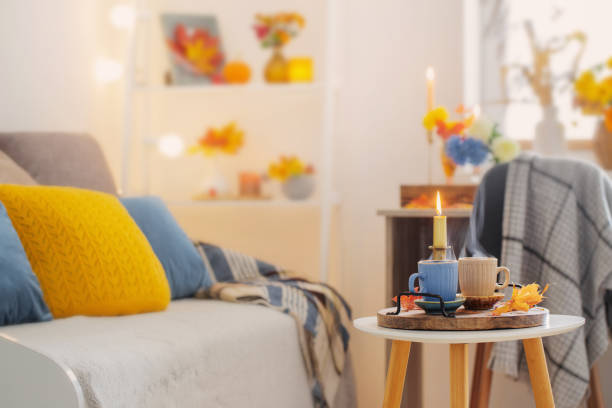 istock two  cups with hot drinks at home with autumnal decor 1496233152