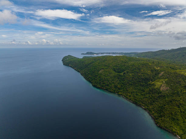 Coast Weh Island. Indonesia. Aerial view of coast of Weh island with rainforest and jungle. Aceh, Indonesia. sabang beach stock pictures, royalty-free photos & images