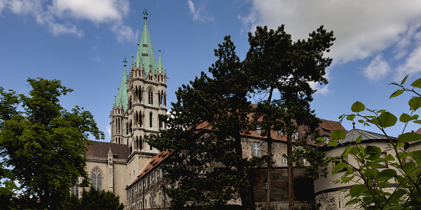 Germany, Saxony-Anhalt - May 17, 2023: Cathedral of Naumburg at river Saale (Germany). The Naumburger Cathedral of St. Peter and St. Paul, UNESCO World Heritage Site.