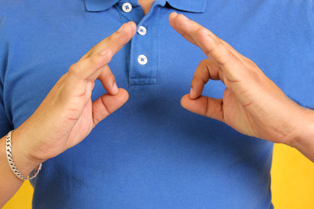 Hands of a Latino man makes sign language, expression and gesture-spatial configuration and visual perception with which deaf people