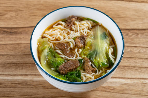 istock angle view bowl of rice noodles with beef and cabbage horizontal composition 1496237745