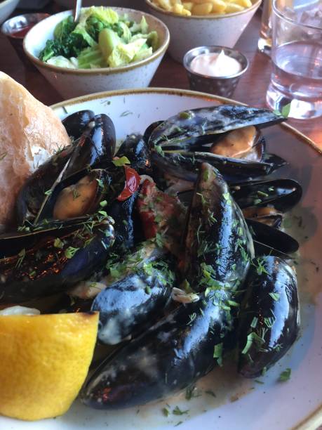 istock Restaurant main seafood, the fresh mussels, The Scallop Shell. 1496246972