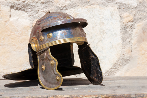 horizontal view of an Imperial helmet or Galea: A Roman military helmet, worn by legions of the ancient Roman Empire. Symbolizing power and strength, it embodies the valor and legacy of ancient Rome