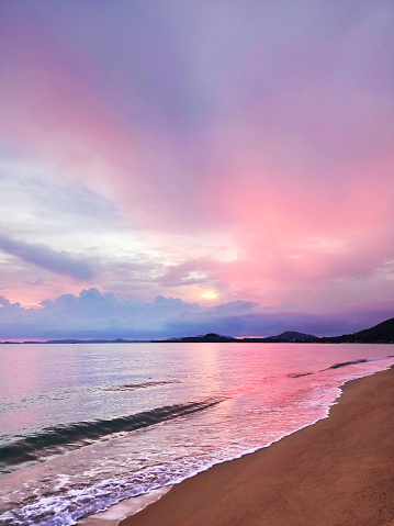 Beautiful sea sunset, ocean sunrise, tropical island beach dawn, colorful pink red purple cloud, blue sky, sun reflection on water, peaceful paradise nature landscape, summer holiday, vacation, travel