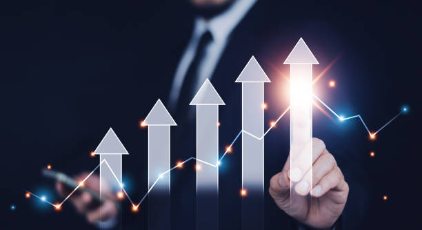istock Businessman pointing arrow graph corporate future growth plan, Business development to success and growing growth concept,  finance and banking, marketing, strategy and planning to corporate. 1496264816