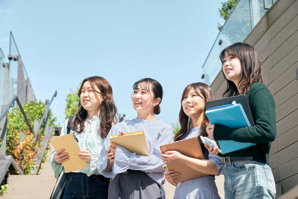 istock young women looking up at the sky 1496266665