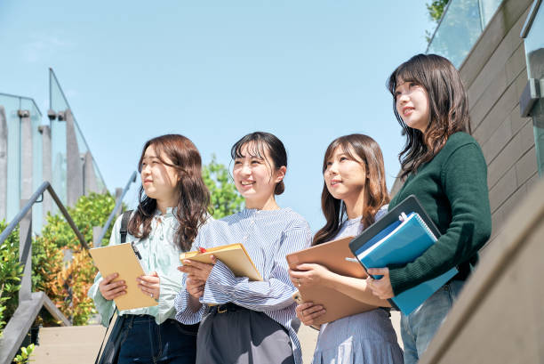 istock young women looking up at the sky 1496266690