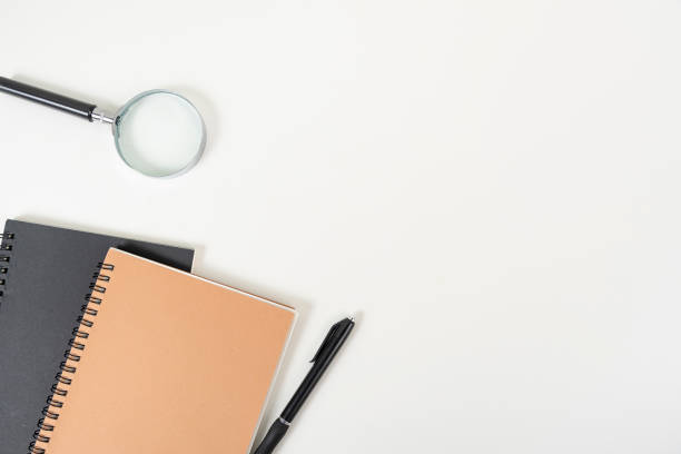 istock white office desk table Top view with copy space. Flat lay. 1496266717