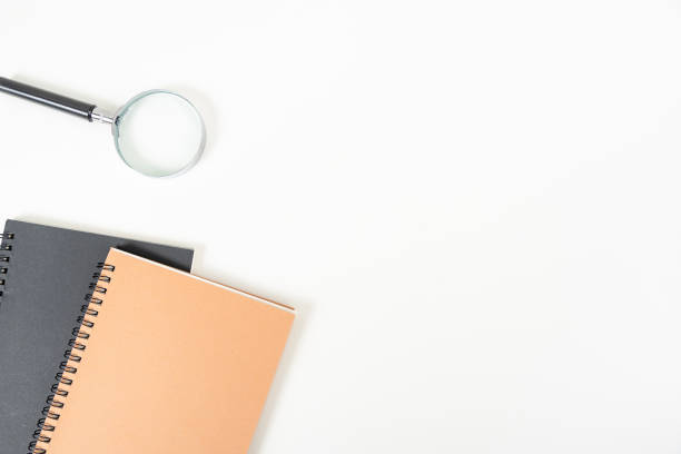 istock white office desk table Top view with copy space. Flat lay. 1496266725
