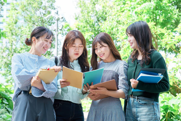 istock Four young women smiling outdoors 1496267812