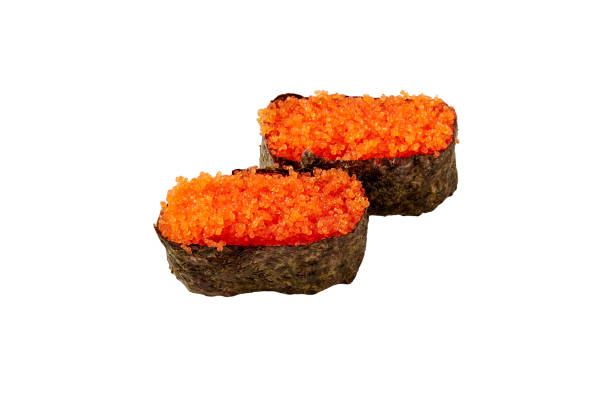 白い背景に2つのトビコ寿司(トビウオ卵寿司)。人気の日本食。 - caviar salmon red gourmet ストックフォトと画像