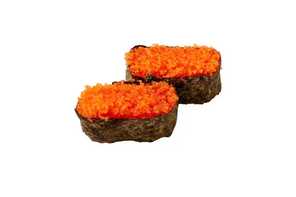 Photo of Two pieces of tobiko sushi (flying fish roe sushi) isolated on white background. popular Japanese food.