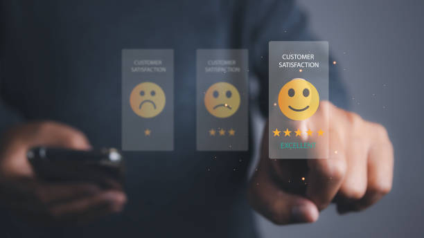 istock Man using phone giving high score for feedback review satisfaction service. 1496269885