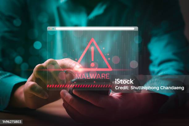 Malware Concept With Person Using Smartphone And Computer Hack Password And Personal Data Cybercriminals Hackers Viruses Worms Trojans Ransomware Spyware Adware Botnets Stock Photo - Download Image Now