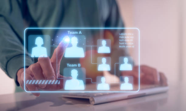 istock teamwork concept, team management, manager businessman using computer laptop pointing at organisation chart, HR management, team recruiting 1496277540