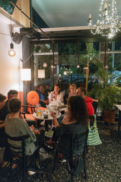 istock Group of friends in a cafe 1496282078
