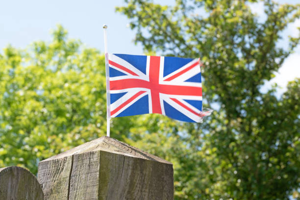 istock Union Jack flag on fence post 1496284838