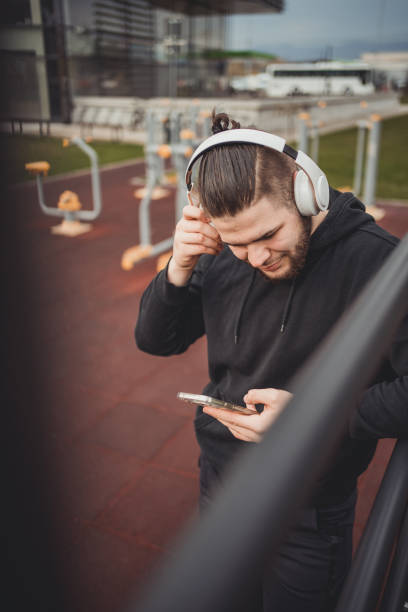 istock One young man athlete taking a break during outdoor training 1496284963