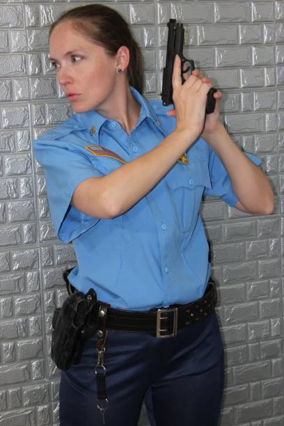 istock Female police officer, blue uniform 1496288543