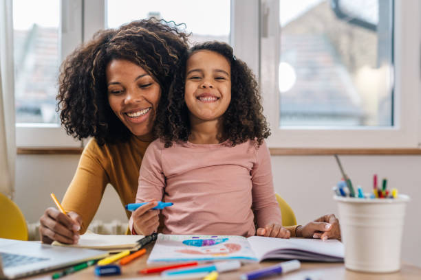 istock multiracial woman at home playing with her daughter 1496289946