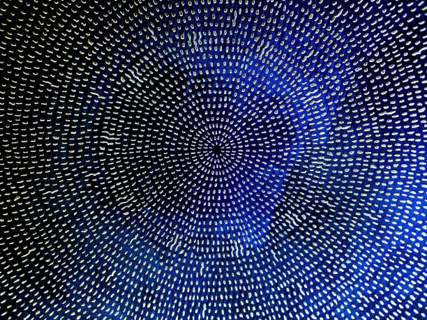 istock Abstract Black and Blue Spiral Design Close-up 1496294213