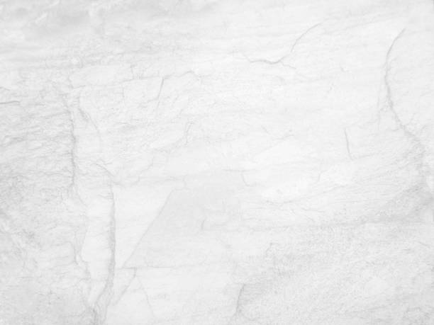 istock Surface of the White stone texture rough, gray-white tone. Use this for wallpaper or background image. There is a blank space for text. 1496296310