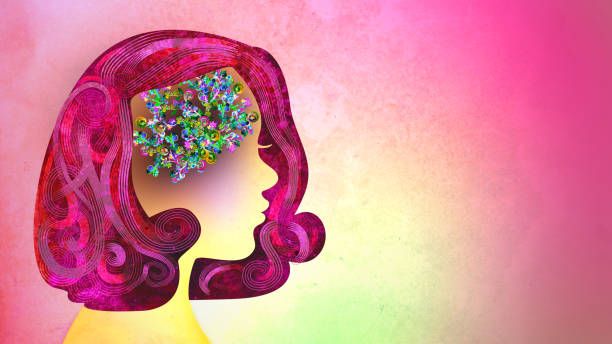 istock The Female Brain. Flowers and vines inside a woman's head, with copy space. 1496301359