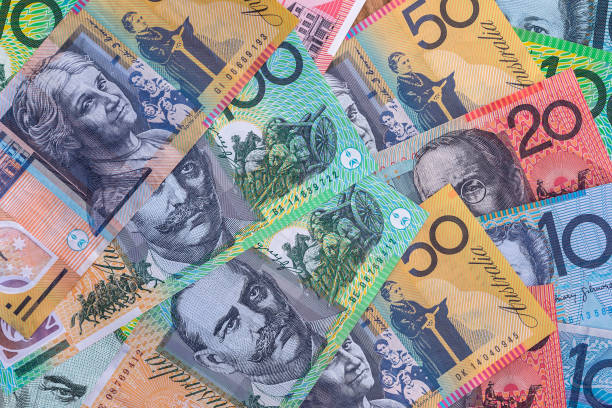 istock Australian dollar banknotes used as background, closeup 1496303922