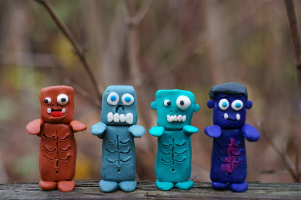 istock Funny monsters made of plasticine. 1496311880