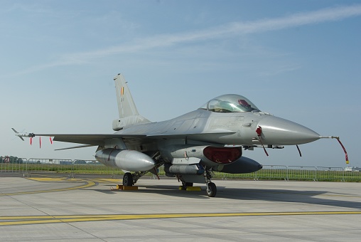 A F/A-18 Hornet on the runway just before taking off.  Note the two seat configuration.
