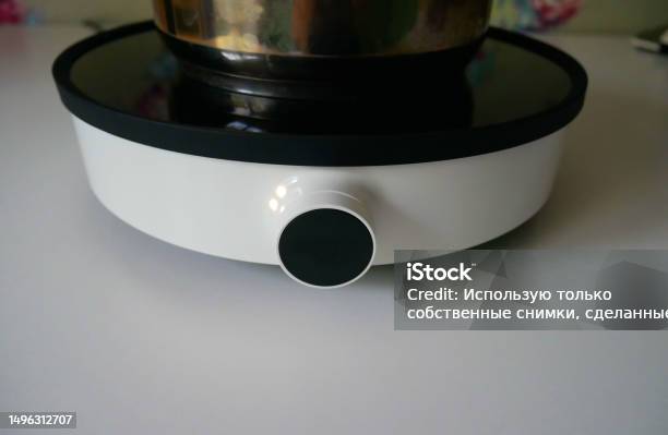 Using An Electric Tile Stock Photo - Download Image Now - Color Image ...