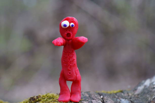 istock Funny monster made of plasticine. Figures for Halloween. 1496314384