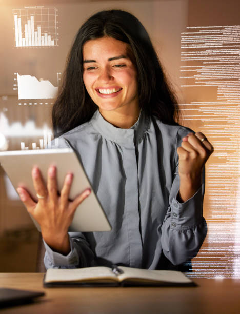 istock Woman, tablet and smile in celebration for analytics, corporate data or information success at night. Happy female analyst celebrating with touchscreen for promotion, profit or company investments 1496315272