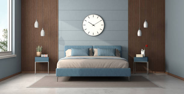 istock Blue and wooden master bedroom with double bed 1496319986
