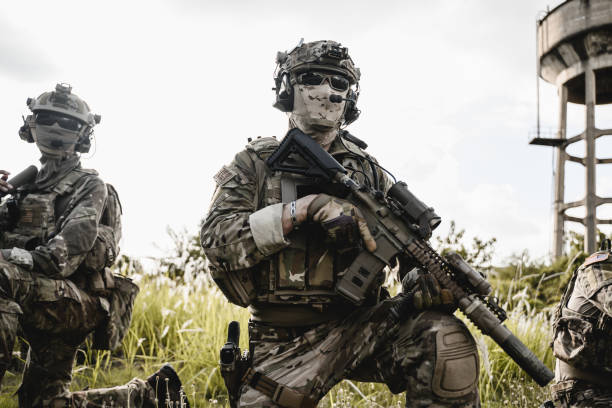 istock Smart teamwork of soldiers running forward and attacking enemy 1496321022