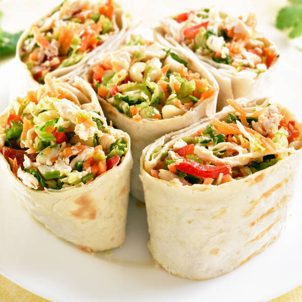 istock Tortilla wraps with chicken and vegetables 1496332583