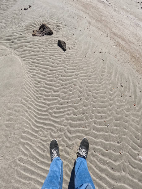 istock Young Man Standing On The Beach In Greece 1496332619
