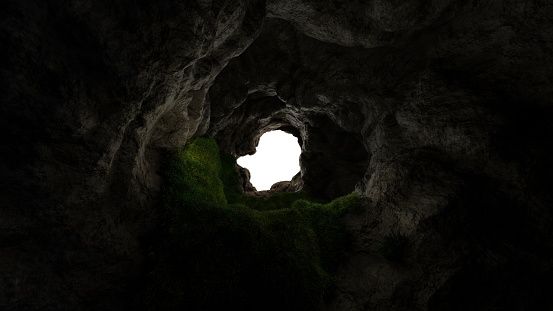 View from deep cave with grass, hole in rocky mountain, sunset. 3d render